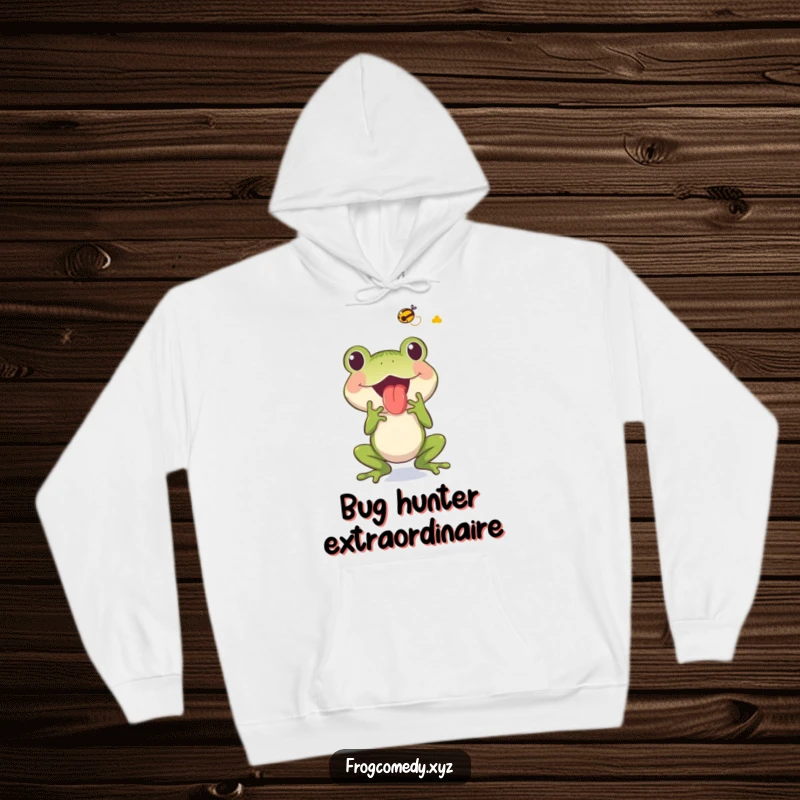 Soft hoodie showcasing a funny frog character mid-action, with its tongue out to catch a flying insect.