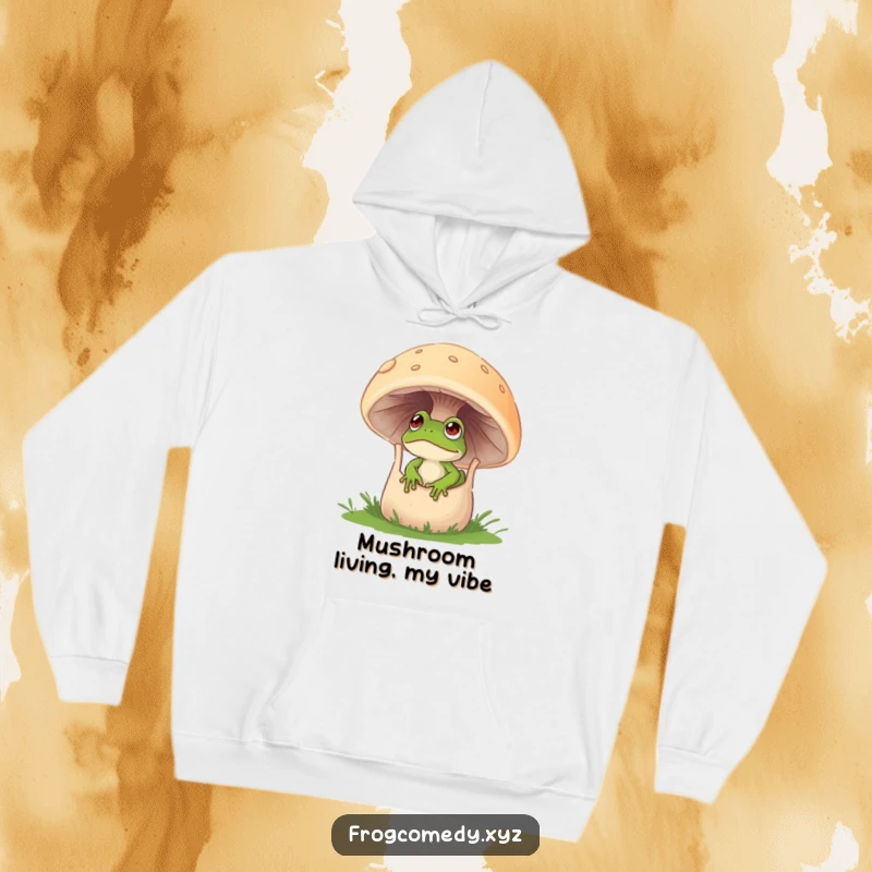Funny hoodie depicting a curious frog peeking out from a large, hollowed-out mushroom.