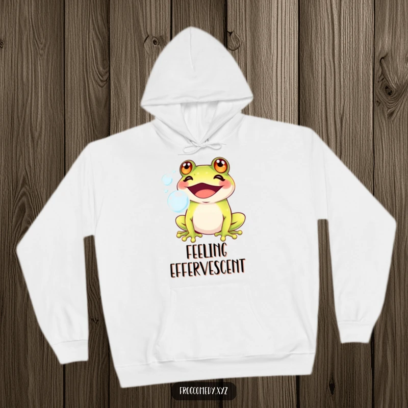 Funny Kawaii frog with a big grin blowing bubbles, printed on a warm hoodie, combining cuteness with cozy, playful humor.