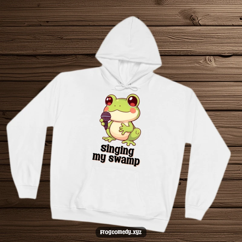 Funny Kawaii frog hoodie with a cute frog holding a tiny microphone and croaking cheerfully, a delightful and warm garment.