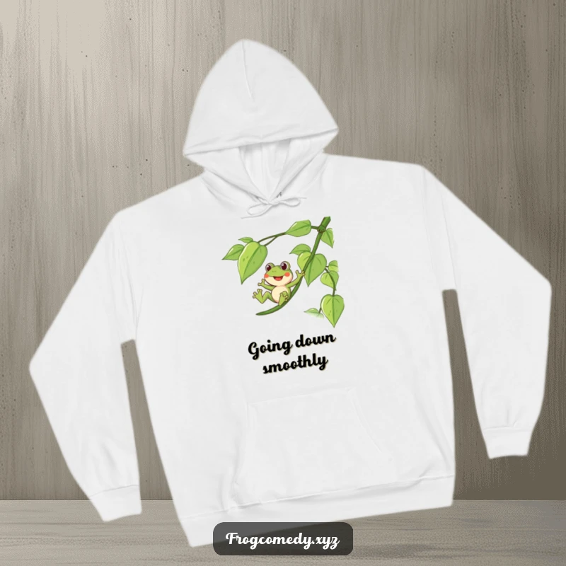Funny hoodie featuring a delighted frog sliding down a long, leafy vine, perfect for cozy adventures.