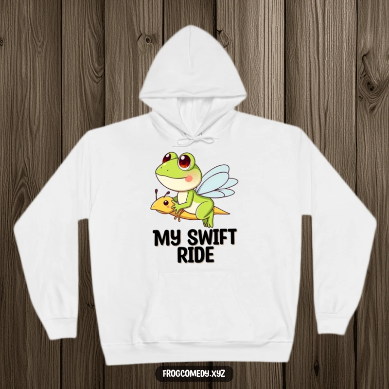 Funny hoodie featuring a frog character riding a friendly dragonfly, designed for comfort and sparking imaginative adventures.