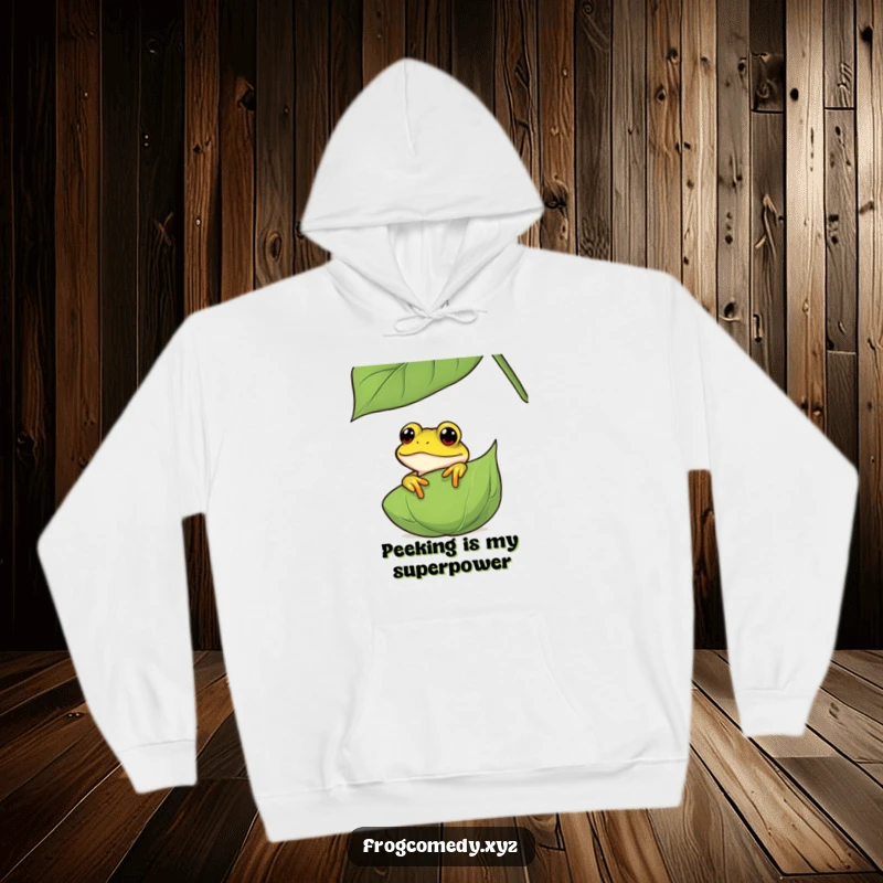 Funny curious frog hoodie, depicting an amphibian peeking from behind a leaf, offering warmth and a touch of playful mystery for screen readers.