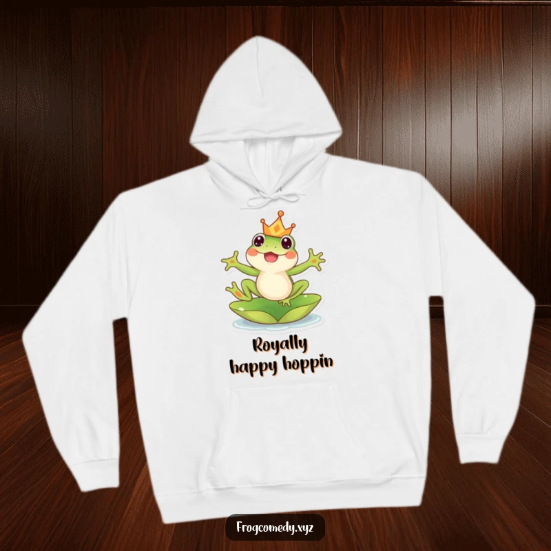 Funny kawaii frog hoodie, showing a happy frog with a crown leaping from a lily pad, offering warmth and humor.