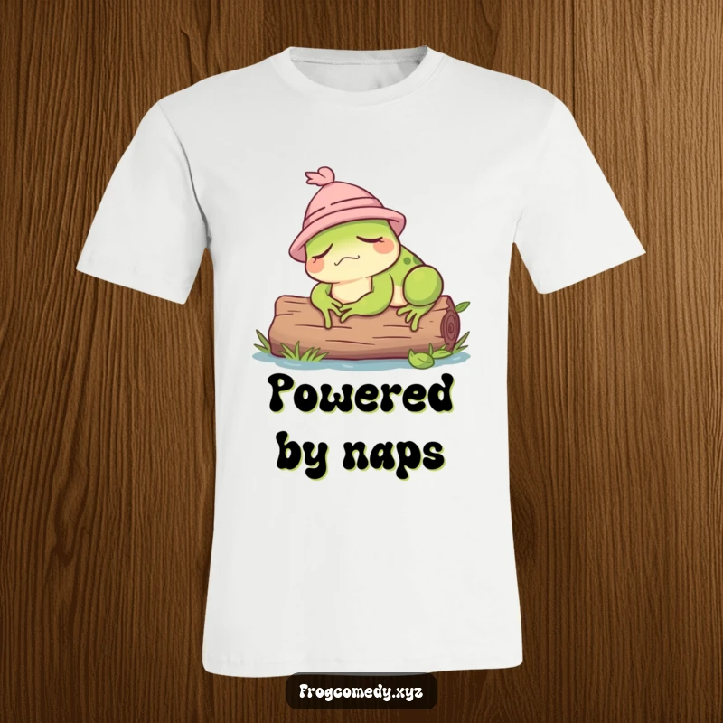 Funny t-shirt with a cute, sleepy frog wearing a small hat, dozing on a log.