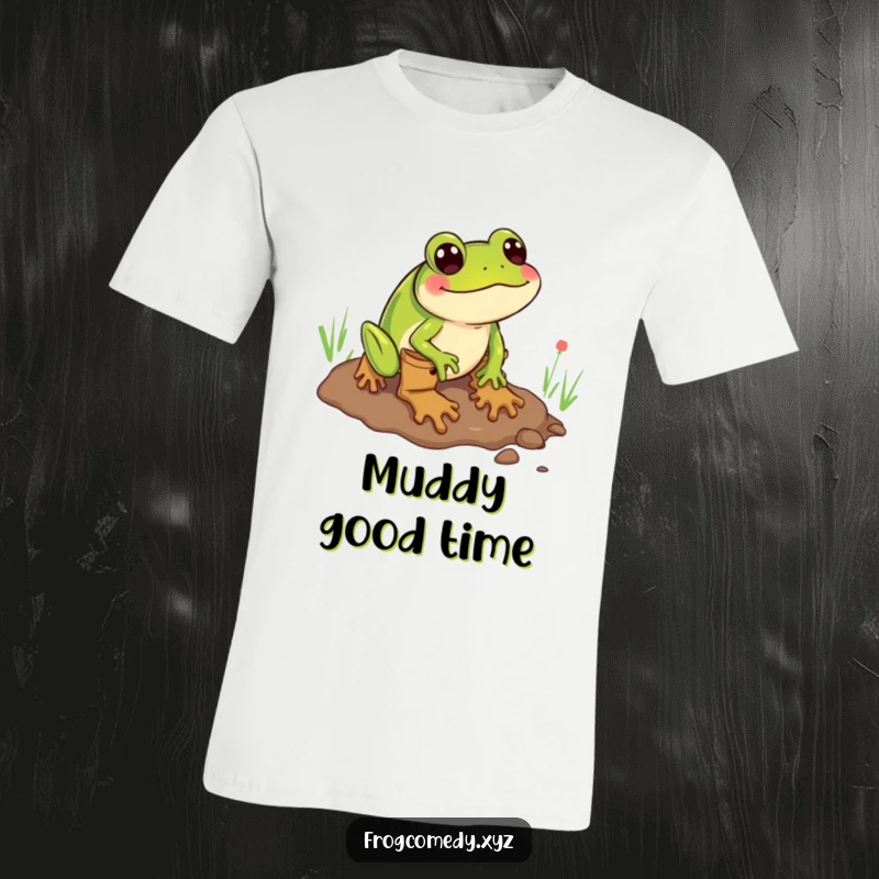 Funny t-shirt featuring a frog wearing boots comically sliding through a muddy puddle, creating a messy, hilarious scene.